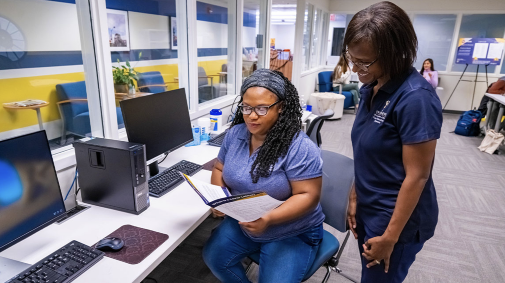 Dr. Nicole Hall advising a student for their career development